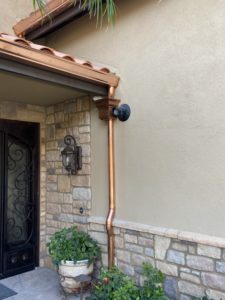 example of our beautiful custom copper rain gutters scupper and downspout